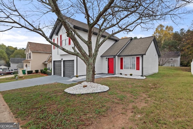 view of front of house featuring a front lawn and a garage