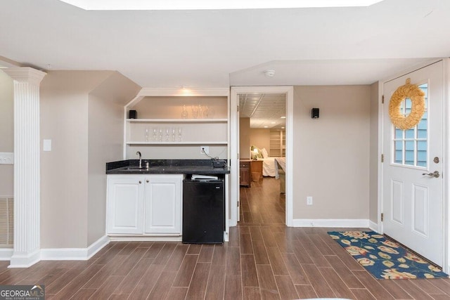 kitchen featuring dark hardwood / wood-style floors and sink