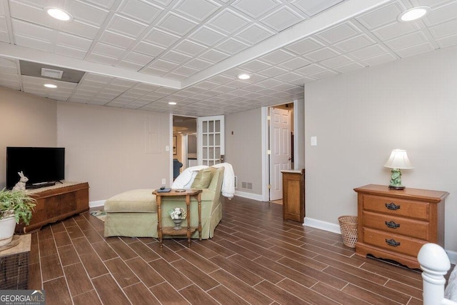 living room with french doors and dark hardwood / wood-style floors