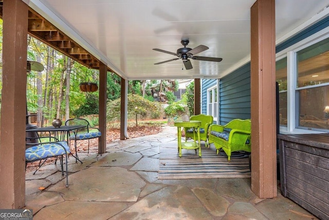 view of patio / terrace featuring ceiling fan