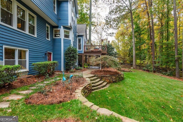 view of yard with a wooden deck