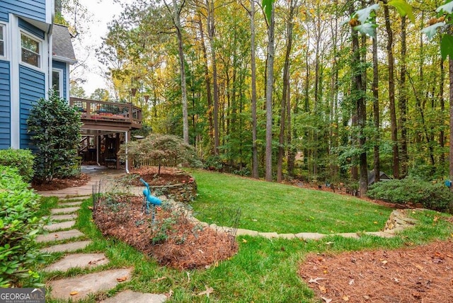 view of yard featuring a deck