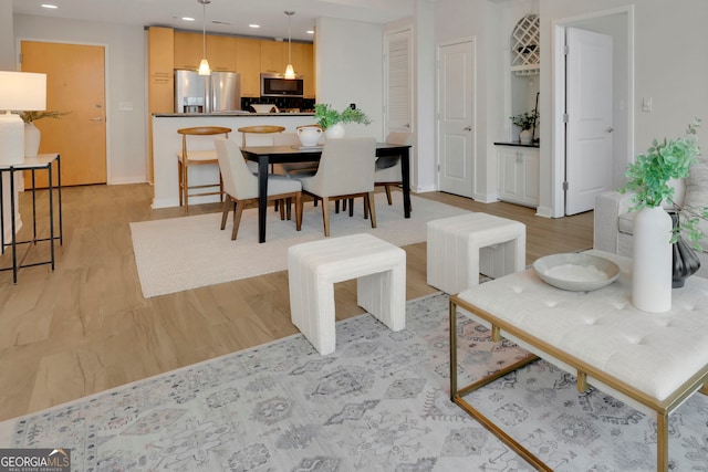 dining area featuring light hardwood / wood-style flooring