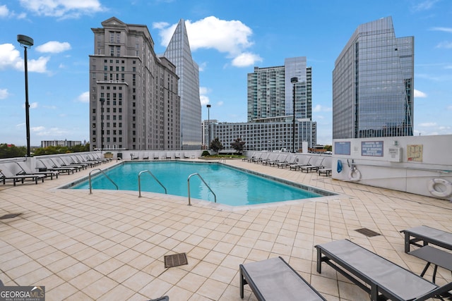 view of pool with a patio area