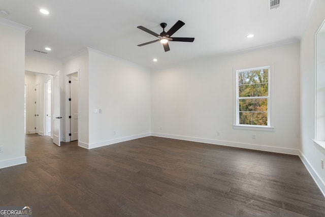 unfurnished room featuring dark wood-type flooring, ceiling fan, and crown molding