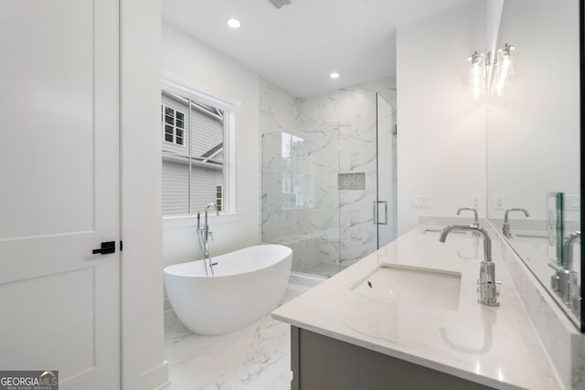 bathroom featuring vanity and separate shower and tub