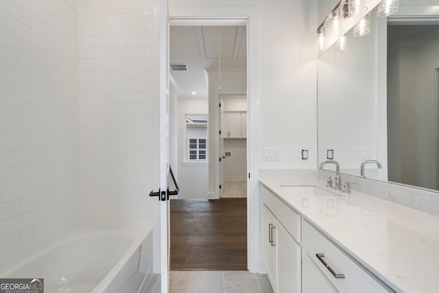 bathroom featuring vanity and wood-type flooring