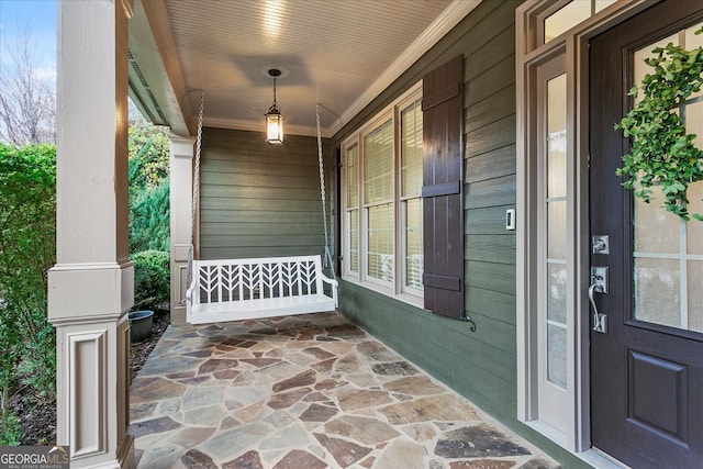 entrance to property with a porch