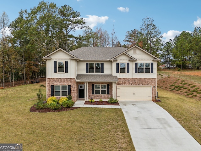 view of front of home featuring a front lawn and a garage