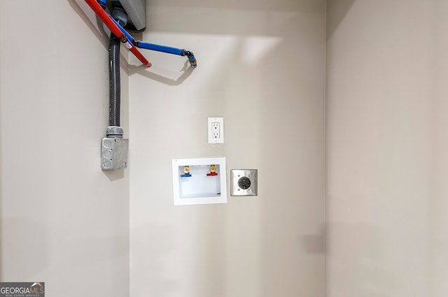 laundry area with washer hookup and electric dryer hookup