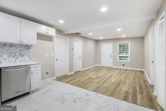 kitchen featuring dishwasher, white cabinets, recessed lighting, decorative backsplash, and baseboards