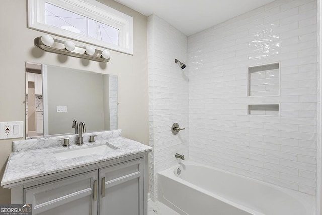 full bathroom with shower / washtub combination, vanity, and marble finish flooring