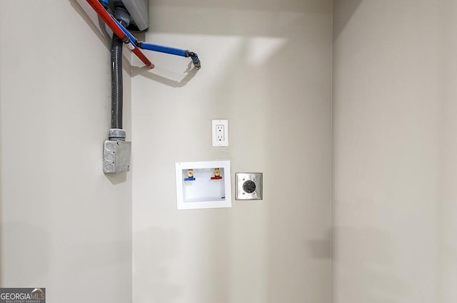 laundry room with washer hookup and electric dryer hookup