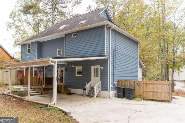 back of property featuring a porch