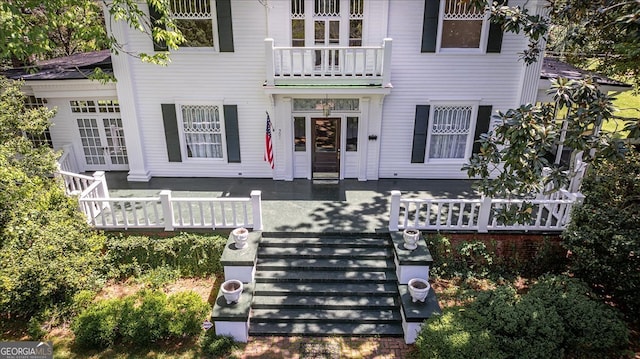 exterior space featuring a balcony