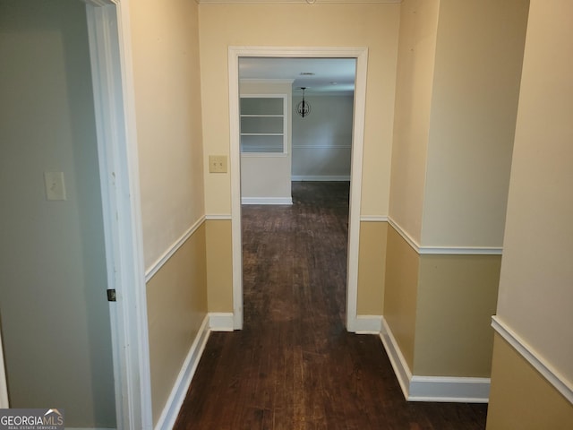 hall with dark hardwood / wood-style flooring