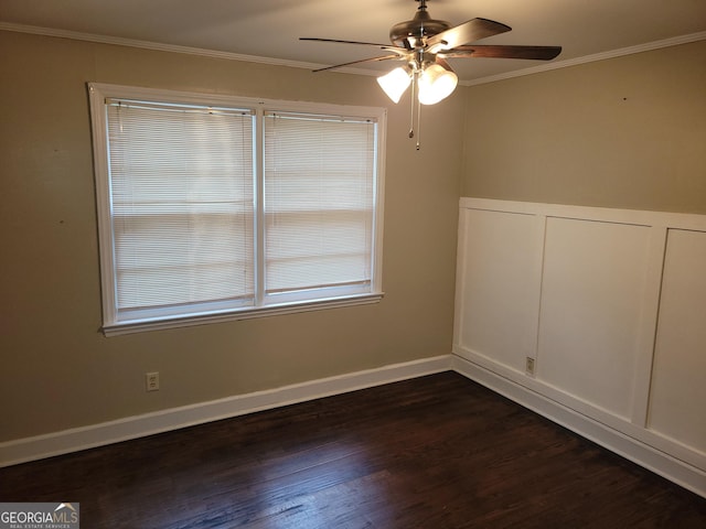 unfurnished room featuring ceiling fan, crown molding, and dark wood-type flooring