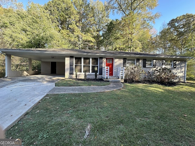 3850 Bright Star Rd, Douglasville, GA 30135 - view of front of house with concrete driveway, brick siding, a front lawn, and a carport