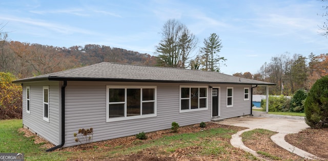 view of side of property featuring a patio