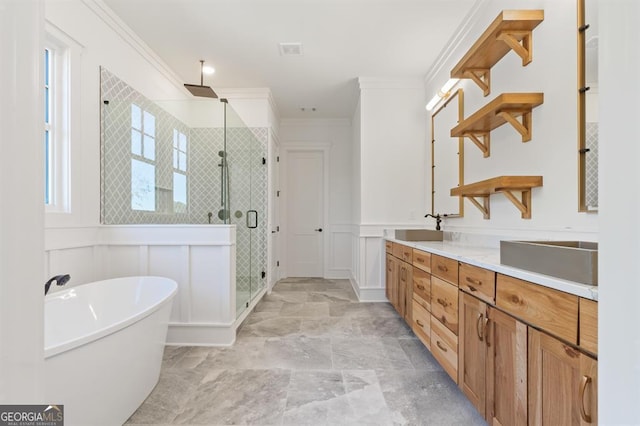 bathroom featuring independent shower and bath, vanity, and ornamental molding