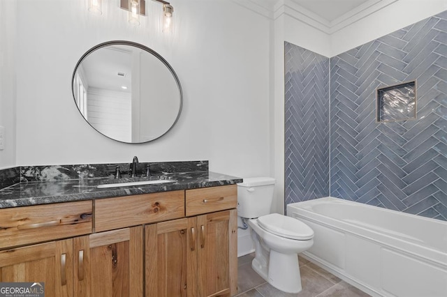 full bathroom with tile patterned floors, ornamental molding, vanity, toilet, and tiled shower / bath