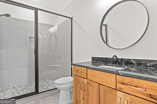 bathroom with ornamental molding, vanity, an enclosed shower, tile patterned floors, and toilet