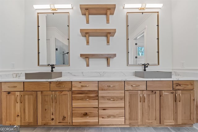 bathroom with vanity and tile patterned floors