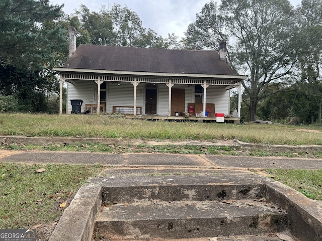 view of front of home featuring covered porch