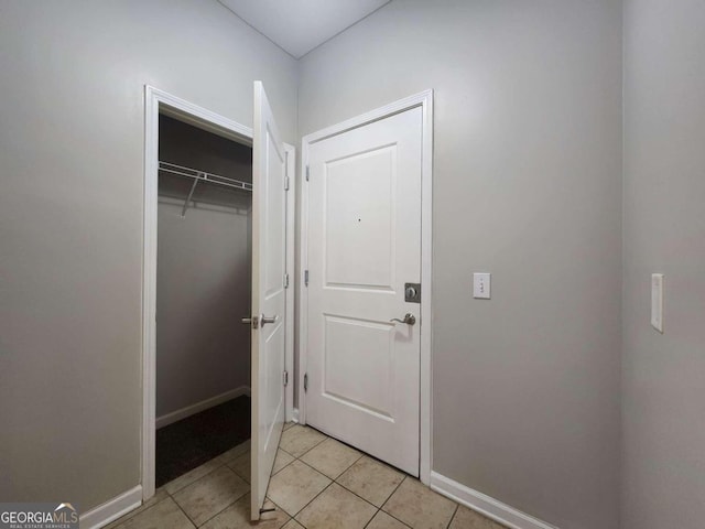 interior space featuring light tile patterned flooring