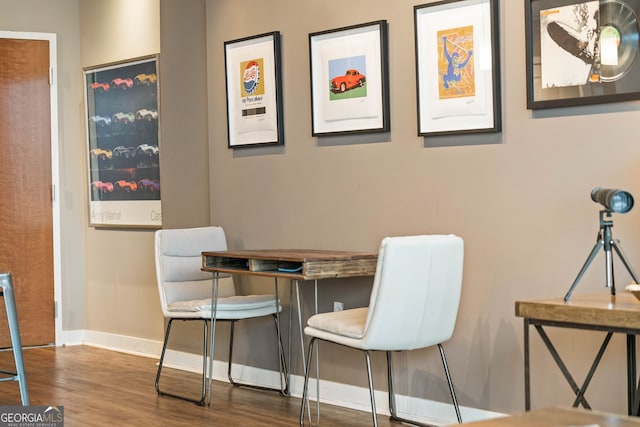 dining area with hardwood / wood-style floors