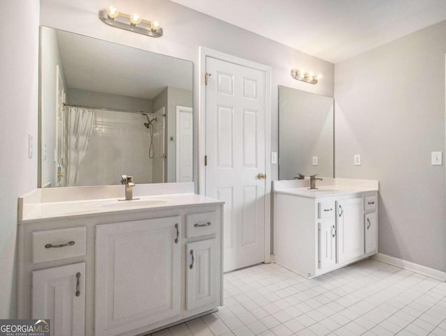 bathroom featuring vanity and a shower with shower curtain