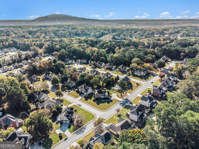 drone / aerial view featuring a mountain view