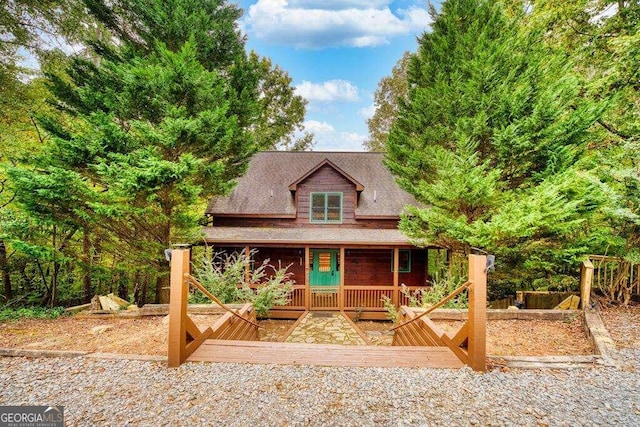 view of front of home with a wooden deck