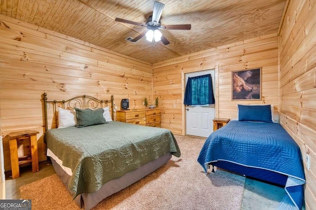 carpeted bedroom with wooden walls, ceiling fan, and wooden ceiling