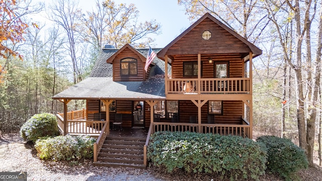 cabin featuring covered porch