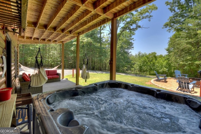 view of patio with a hot tub