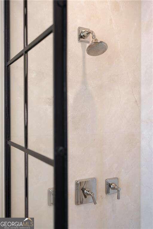 interior details with a shower