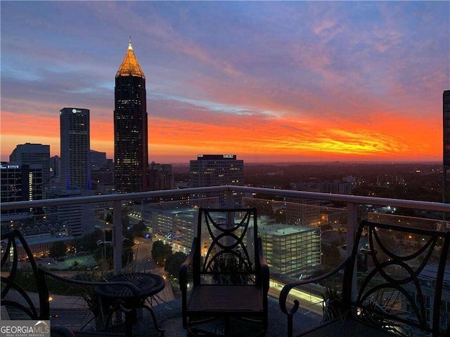 view of balcony at dusk