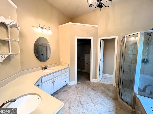 bathroom with vanity, lofted ceiling, tile patterned flooring, shower with separate bathtub, and a notable chandelier