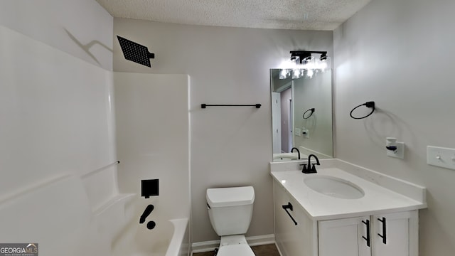 full bathroom featuring toilet, shower / tub combination, vanity, and a textured ceiling