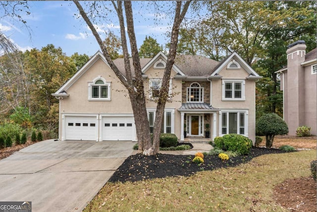 front of property featuring a garage