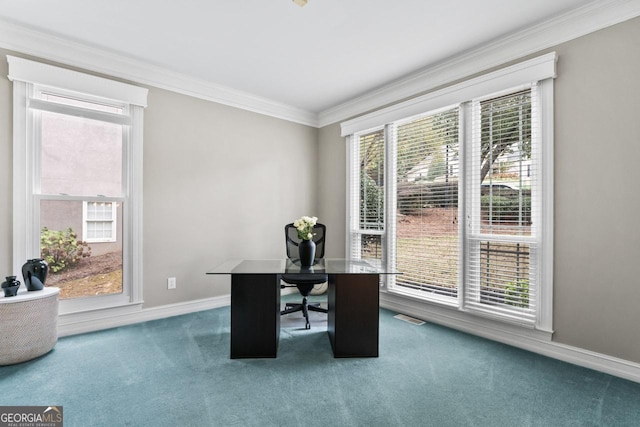 office area with ornamental molding and carpet