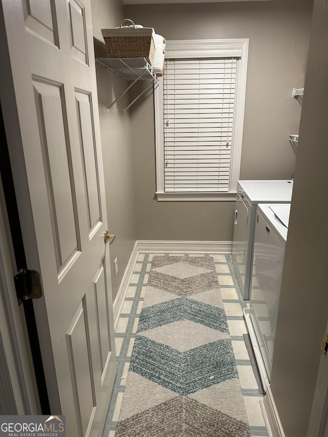 laundry area featuring independent washer and dryer