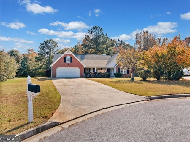 view of front facade with a garage and a front lawn