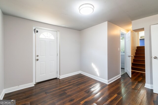 foyer with dark wood-type flooring