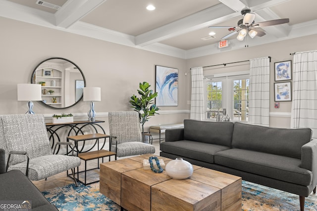 living room with ornamental molding, coffered ceiling, ceiling fan, beam ceiling, and french doors