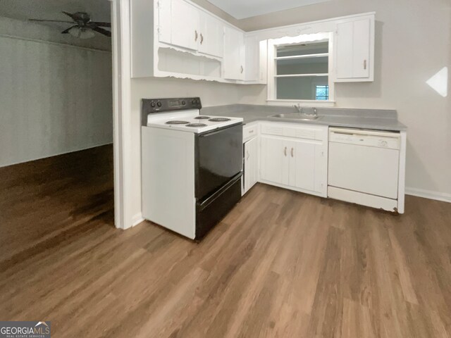 kitchen with white cabinets, white appliances, and dark wood-type flooring