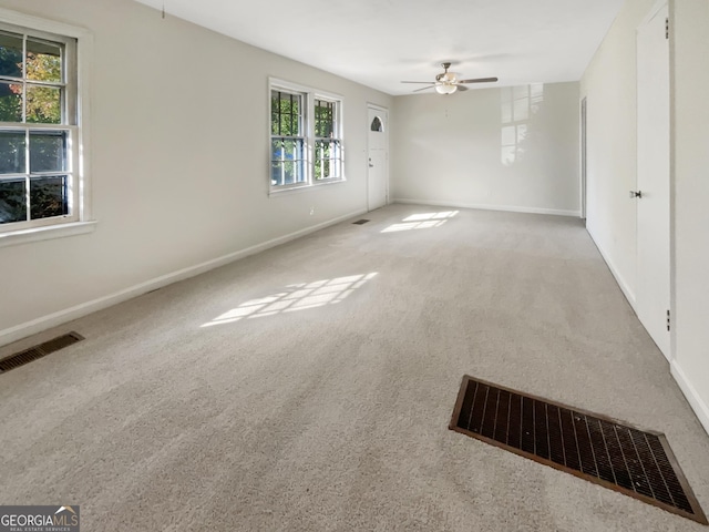828 Pinevalley Dr, Forest Park, GA 30297 - carpeted empty room featuring a ceiling fan and baseboards