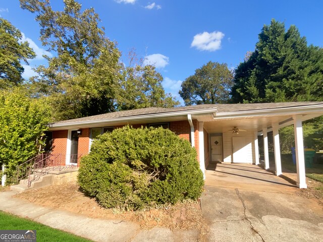 view of front of house featuring a carport