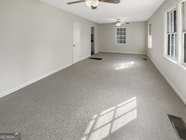 828 Pinevalley Dr, Forest Park, GA 30297 - unfurnished room with ceiling fan, baseboards, and carpet floors